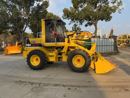 Orijinal Japonya Kullanılmış Komatsu WA100-1 Çarklı Yükleyici Bahçede Çalışmak